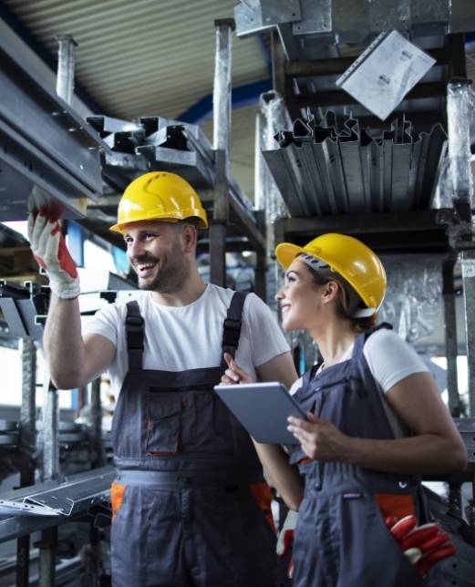 factory-workers-checking-inventory-with-tablet-computer-industrial-warehouse-full-metal-parts